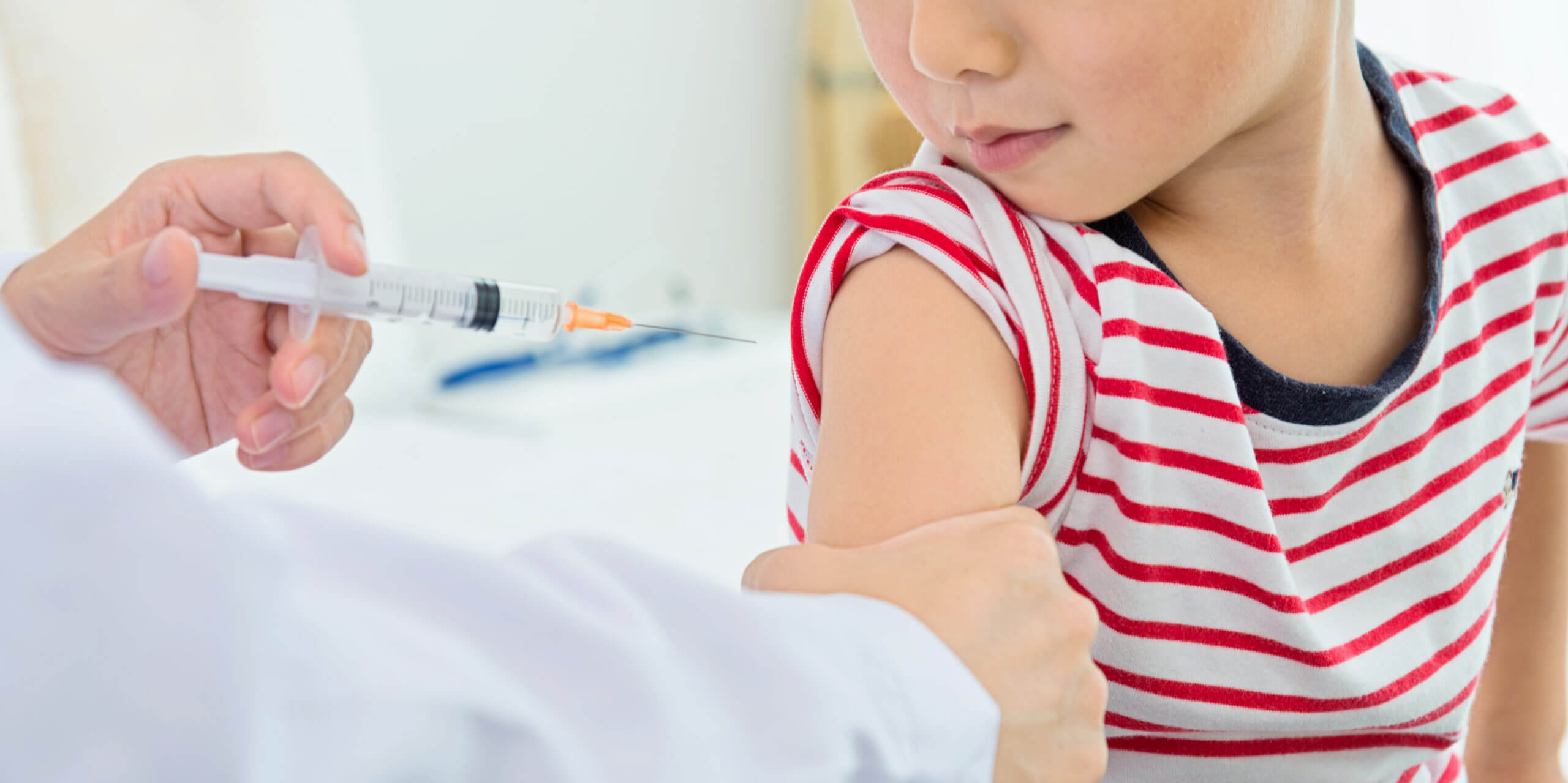 child receiving hepatitis vaccine