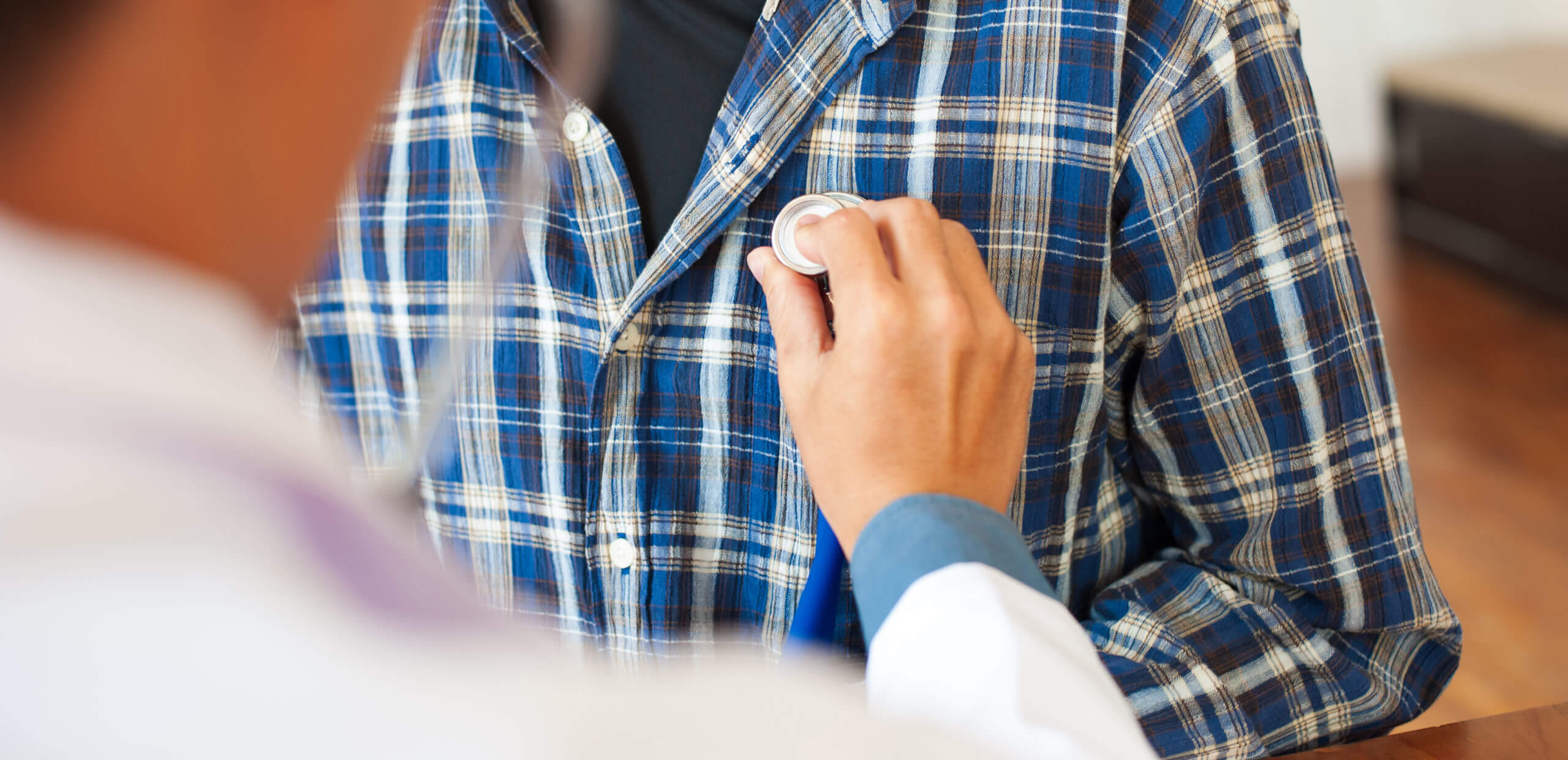 checking patient's heart