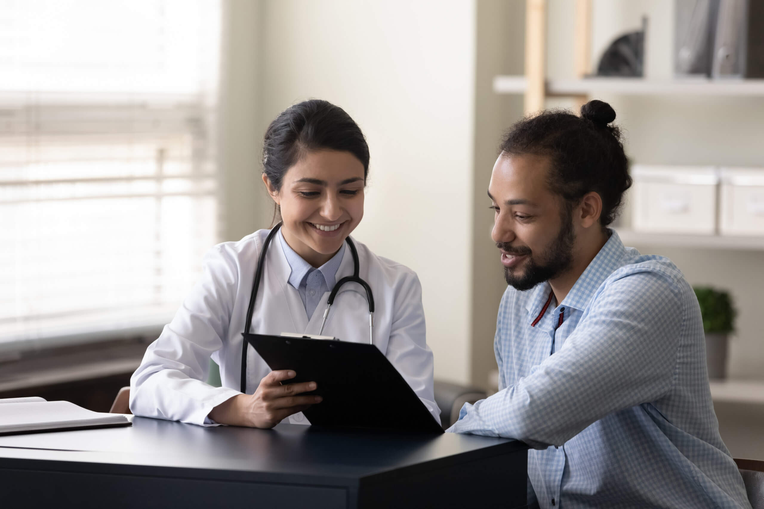 Doctor communicating with patient