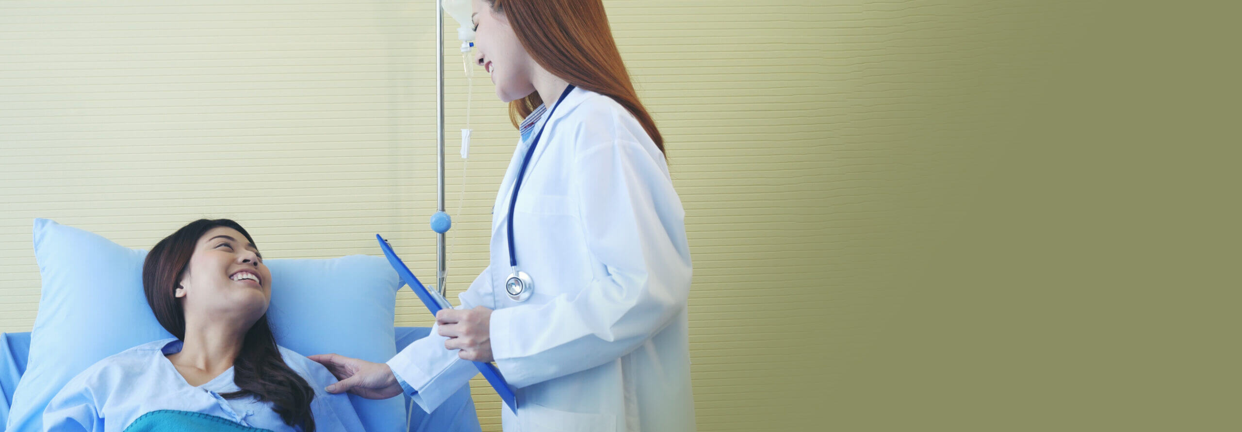 Doctor supporting patient access in consultation with patient.