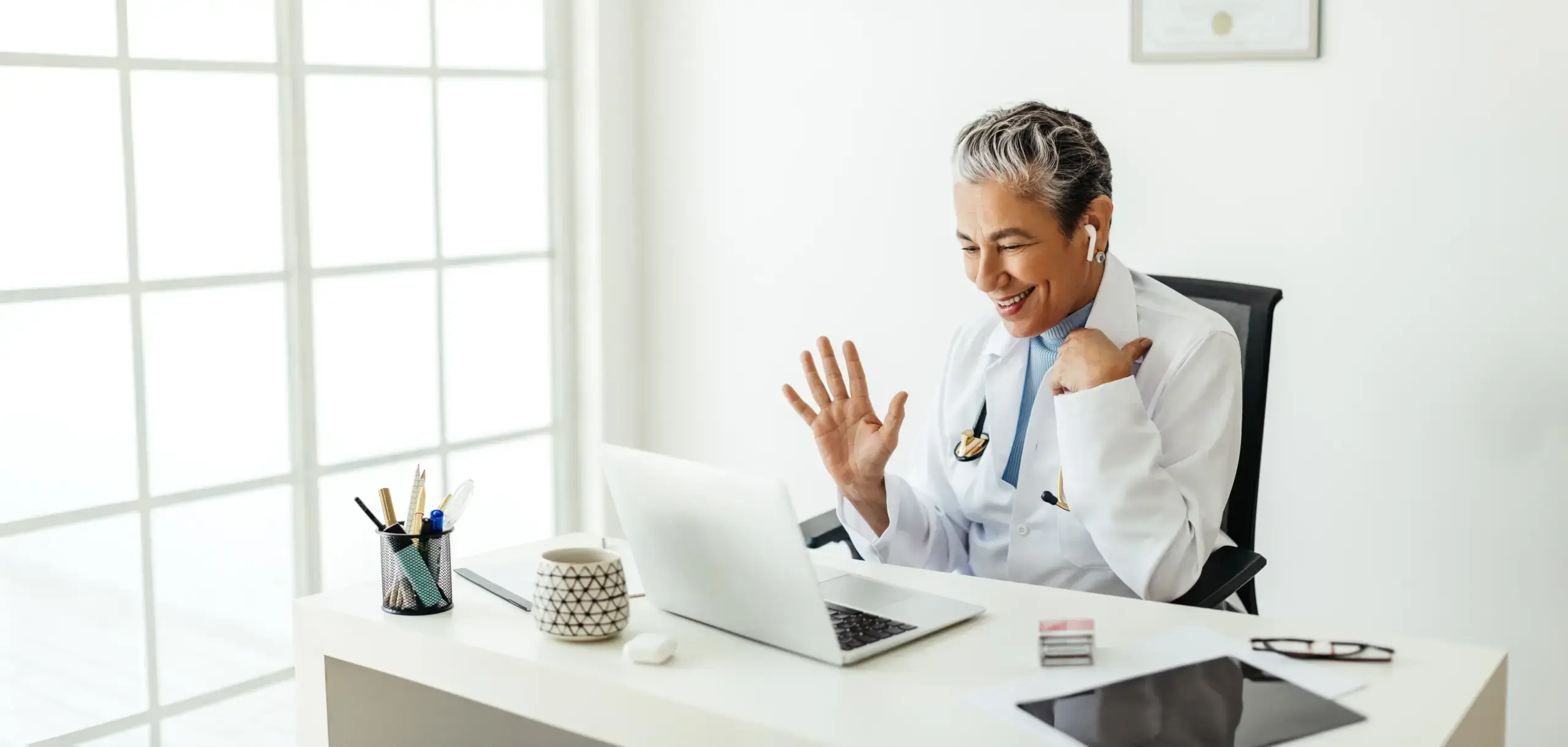 friendly doctor conducting telehealth visit