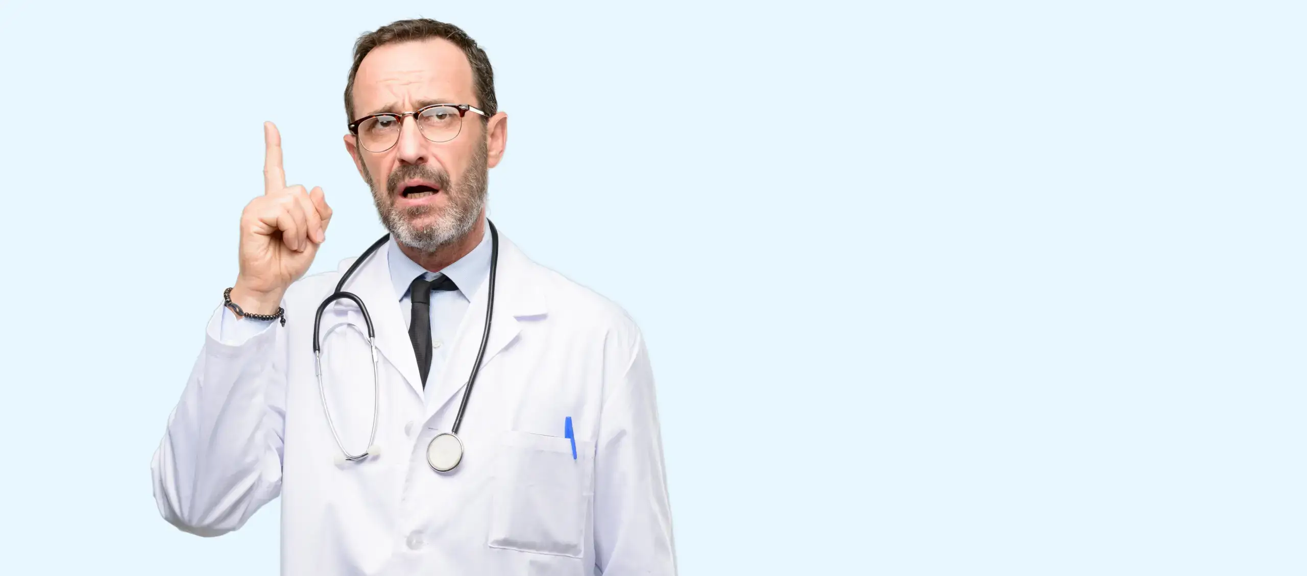 Medical professional pointing upward.