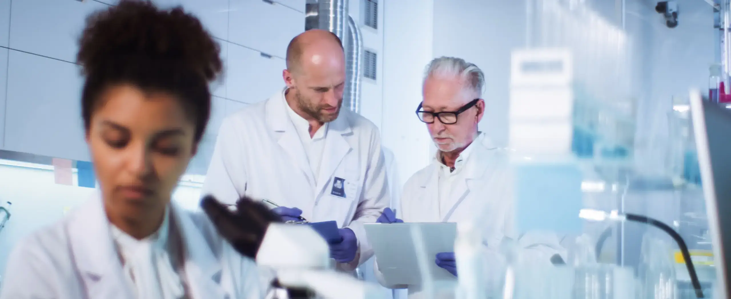 scientists reviewing medical research about tuberculosis