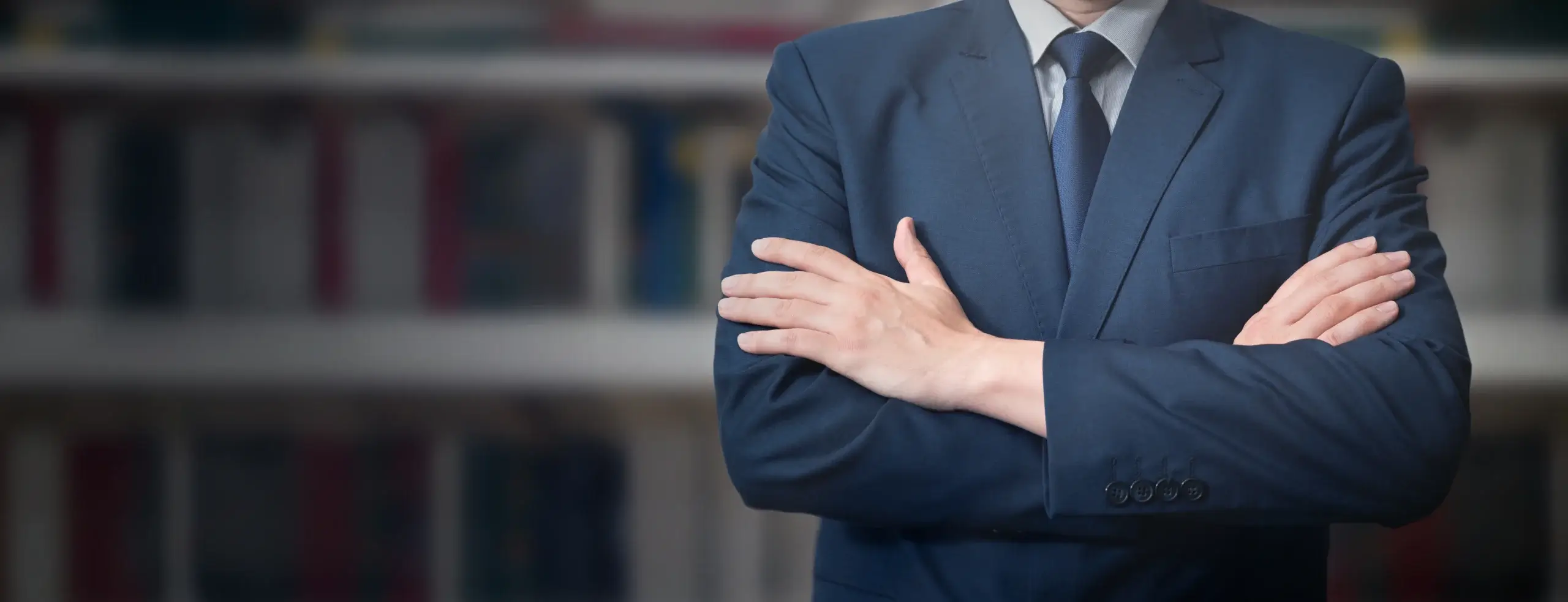 professional with arms crossed