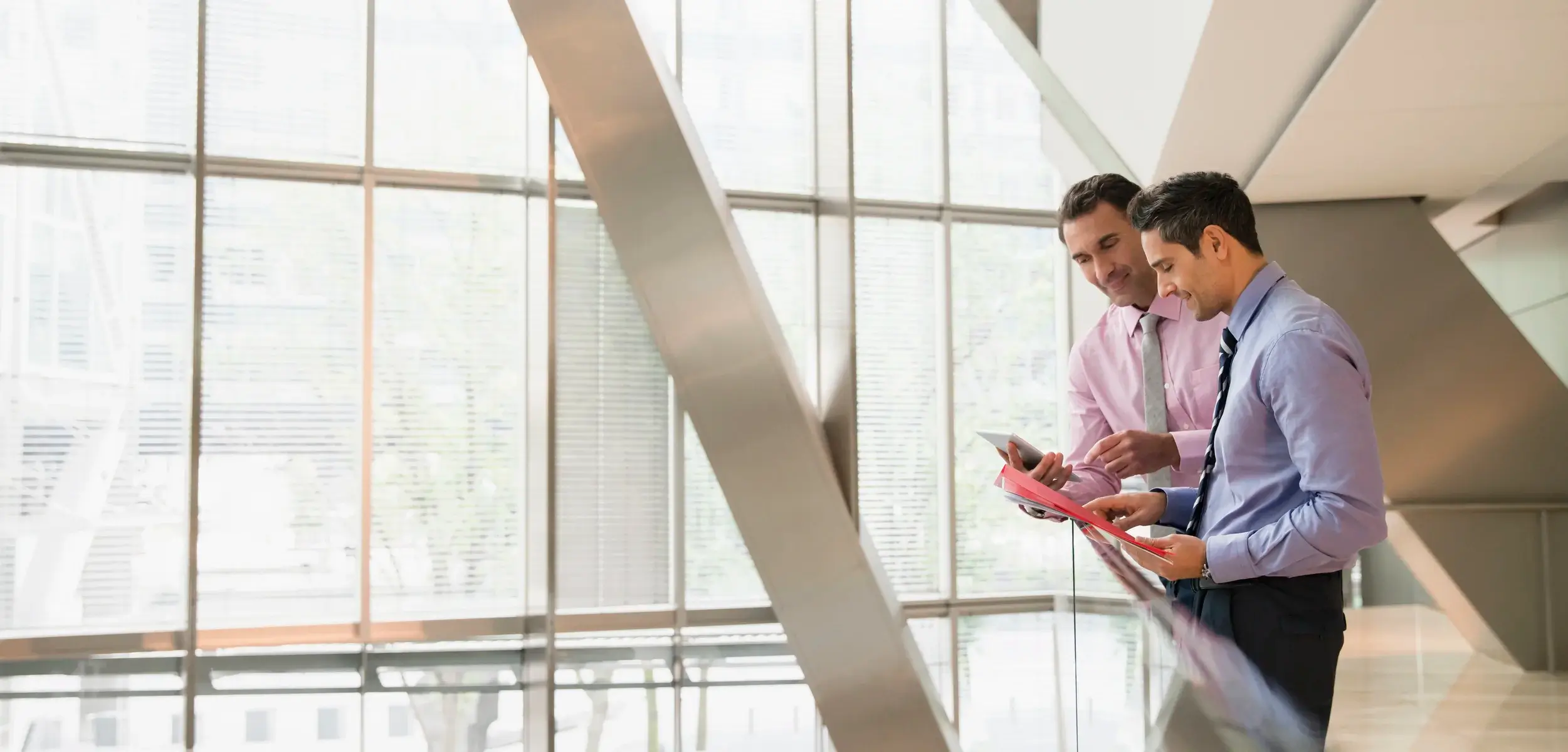 male professionals talking amongst themselves