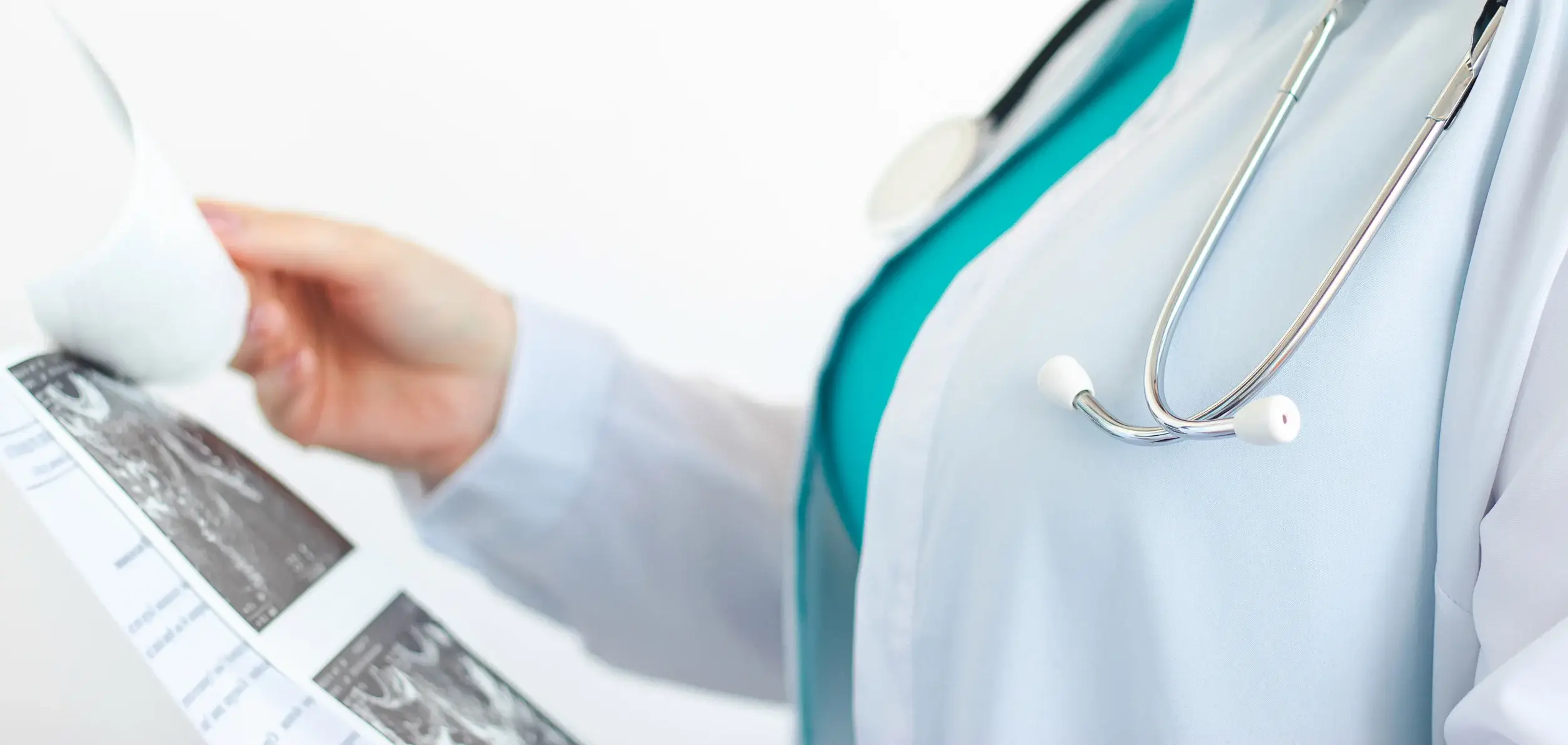 doctor holding scan of ultrasound