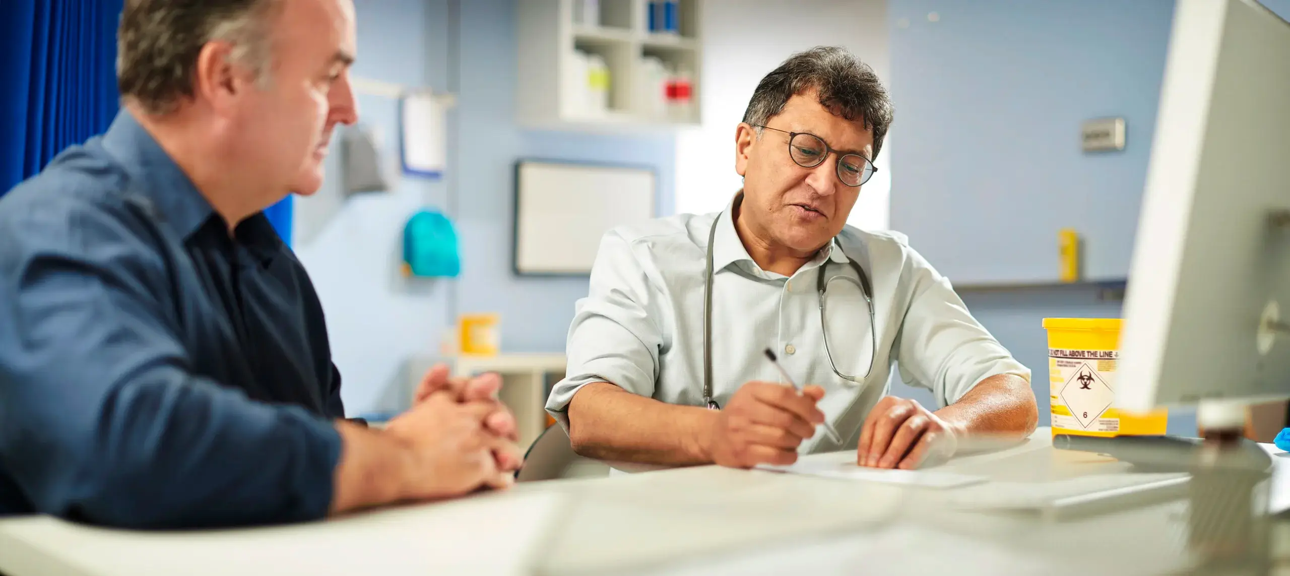 GP with male patient