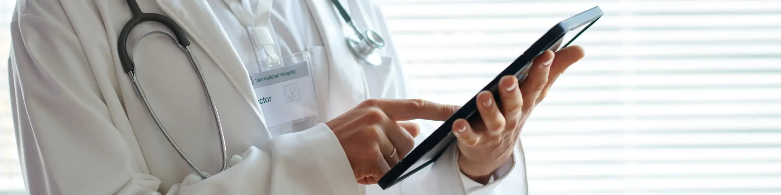 doctor reviewing digital publication