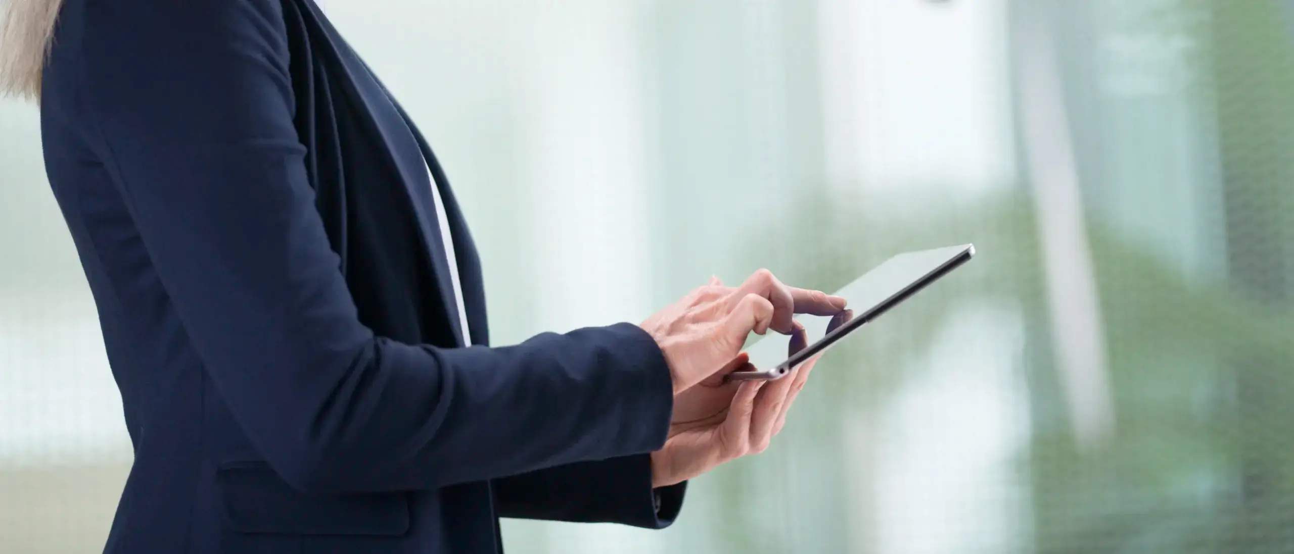 businessperson using digital tablet