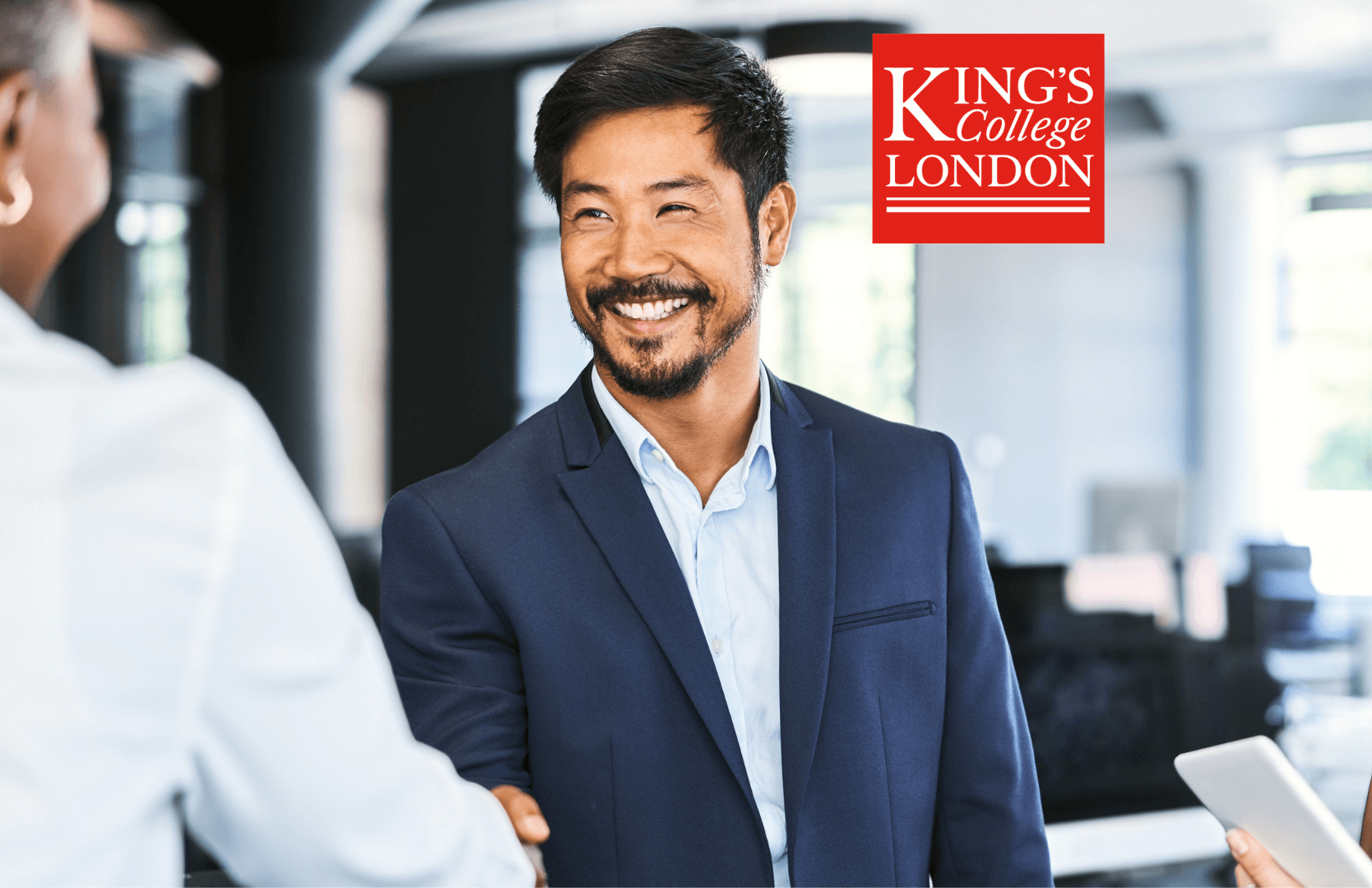 Picture of two medical affairs professional shaking hands with the King's College London logo in the top right hand corner
